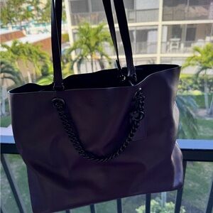Coach purse, tote is plum colored